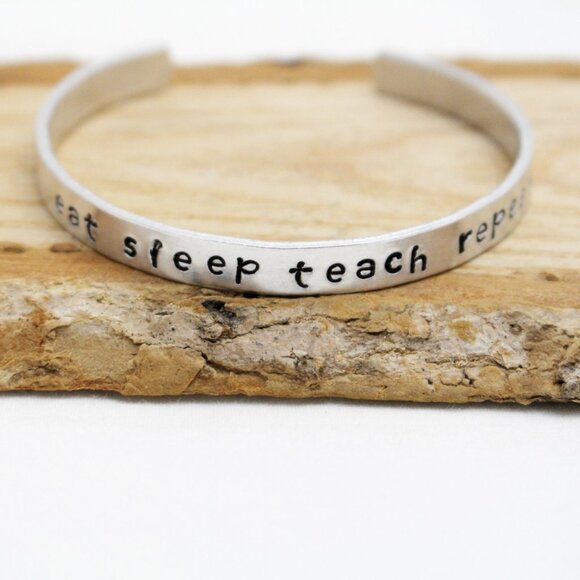 Eat Sleep Teach Repeat - Hand Stamped Anodized Aluminum Bangle - Adjustable - Picture 1 of 14